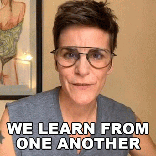 Woman With Glasses Saying We Learn From One Another GIF