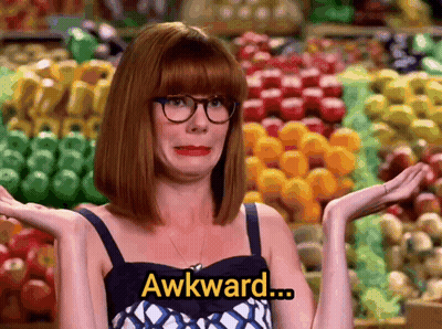 Woman With Glasses Says Awkward In Front Of Fruits GIF