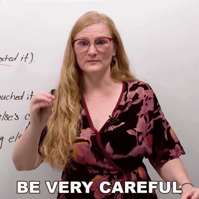 Woman With Glasses Says Be Very Careful GIF