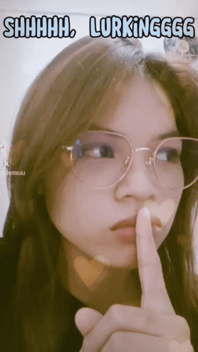 Woman With Glasses Shushing Saying Shhh Lurking GIF