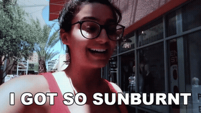 Woman With Glasses Smiling And Saying Sunburnt GIF