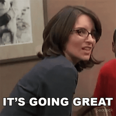 Woman With Glasses Smiling Saying It's Going Great GIF