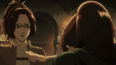 Woman With Glasses Talking To Another Woman In Dark Room GIF