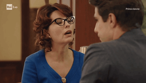 Woman With Glasses Talking To Man Rai HD GIF