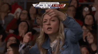 Woman With Glasses Watching Game Score 1-1