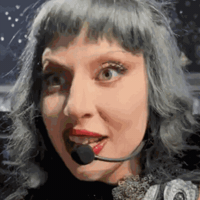 Woman With Gray Hair And Red Lips Wearing Headset Microphone GIF