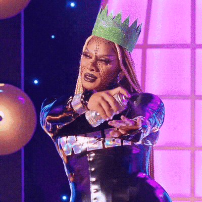 Woman With Green Crown Holding Microphone GIF