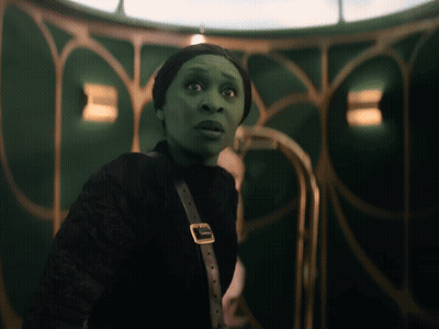 Woman With Green Face And Buckle GIF