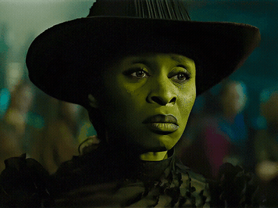 Woman With Green Face And Cowboy Hat GIF