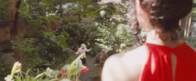 Woman With Green Hair Dancing At Grave GIF