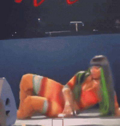 Woman with Green Hair Lying on Floor