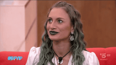 Woman With Green Hair Sitting On Red Couch #Gfvip GIF