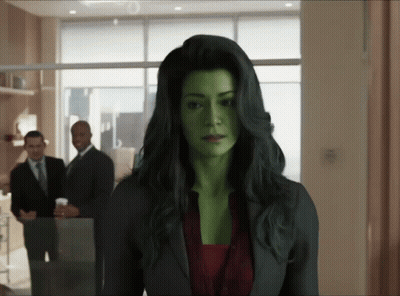 Woman With Green Hair Standing In Front Of Two Men GIF