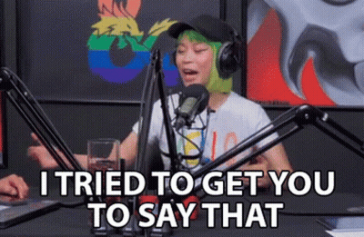 Woman With Green Hair Talking Into Microphone GIF