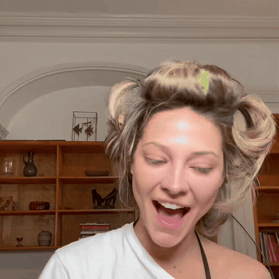 Woman With Hair Curlers Laughing GIF