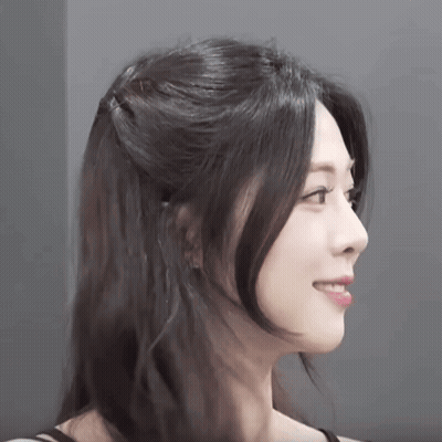 Woman With Half-Up Half-Down Hairstyle Smiling GIF