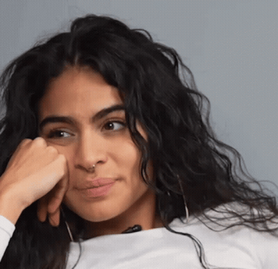 Woman With Hand On Chin Close Up GIF