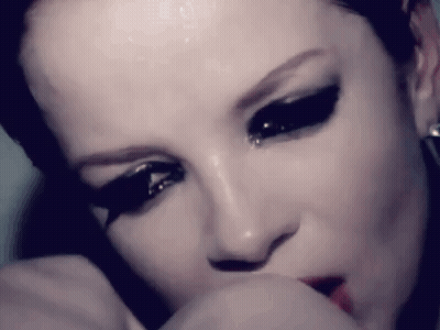 Woman With Hand On Face GIF