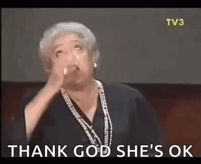 Woman With Hand On Face Saying Thank God She's Ok GIF