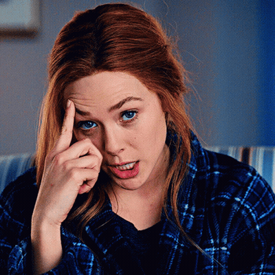 Woman With Hand On Forehead GIF