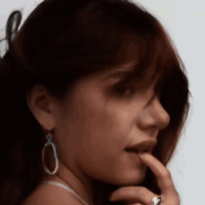 Woman With Hand Over Mouth GIF