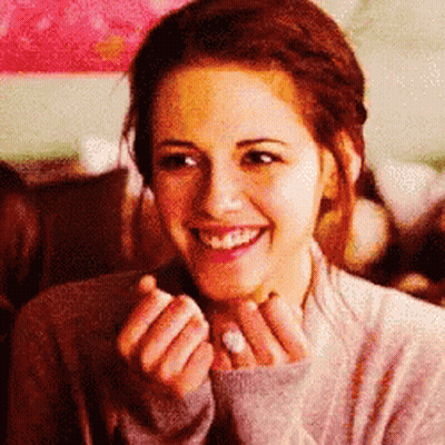 Woman With Hands On Face GIF