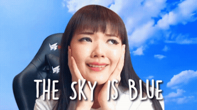 Woman With Hands On Face Saying The Sky Is Blue GIF