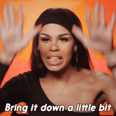 Woman With Hands Up Saying Bring It Down A Little Bit GIF