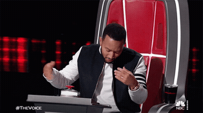 Woman With Hands Up Saying Bring It Down A Little Bit GIF