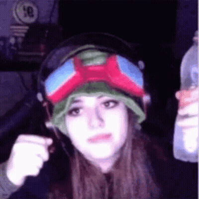 Woman With Hat And Goggles Holding Water GIF
