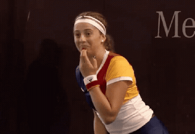Woman With Headband And Adidas Wristbands Holding Hands Saying Me GIF
