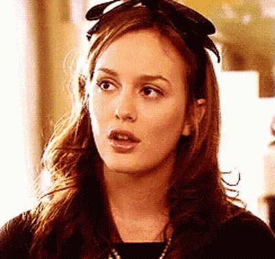 Woman With Headband And Black Shirt GIF