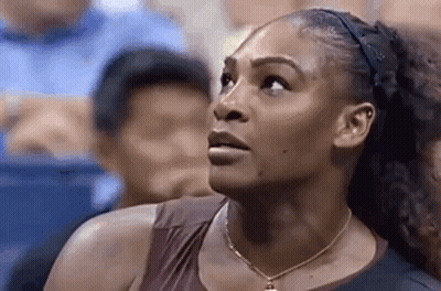 Woman With Headband Looking Up GIF