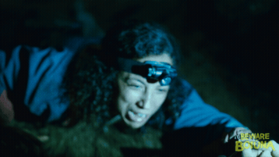 Woman With Headlamp Saying Beware Bona GIF