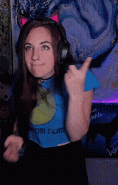 Woman With Headphones And Blue Shirt From Nom GIF