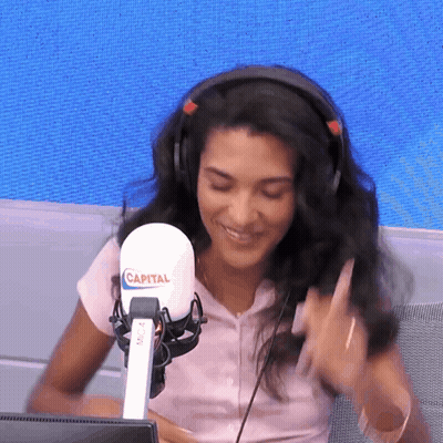 Woman With Headphones And Capital Microphone GIF