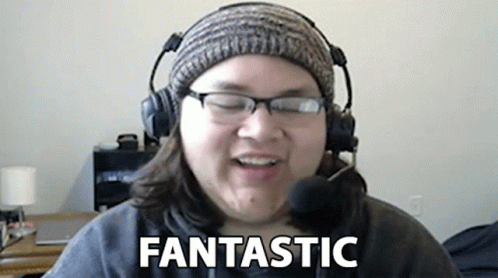 Woman With Headphones And Glasses Says Fantastic GIF