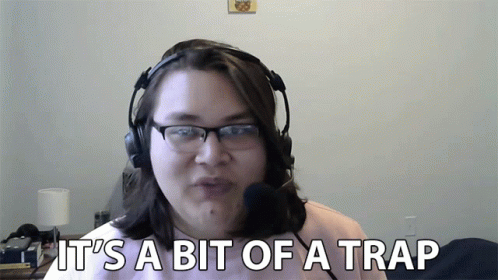 Woman With Headphones And Glasses Says It's A Bit Of A Trap GIF