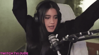 Woman With Headphones And Hands Up At Mic GIF