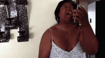 Woman With Headphones And Microphone Holding Coffee GIF