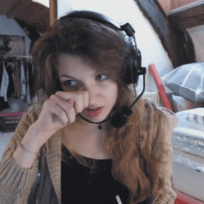 Woman With Headphones And Microphone Wiping Face GIF