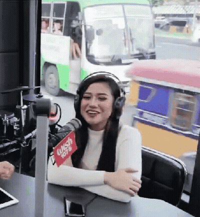 Woman With Headphones At Microphone Wish 107.9 GIF