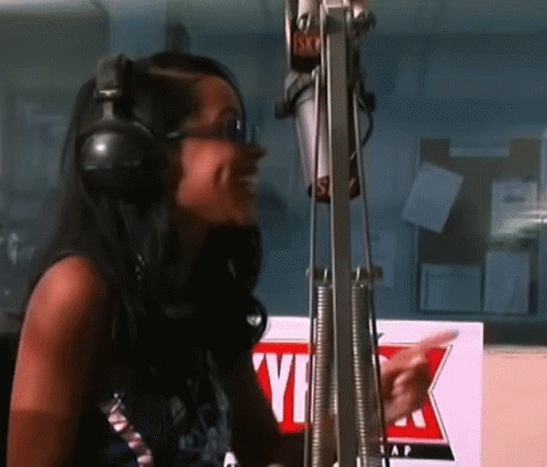 Woman With Headphones At Microphone YHF Sign GIF