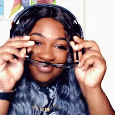 Woman With Headphones Holding Glasses In Front Of Face GIF