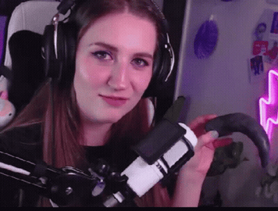 Woman With Headphones Holding Microphone GIF