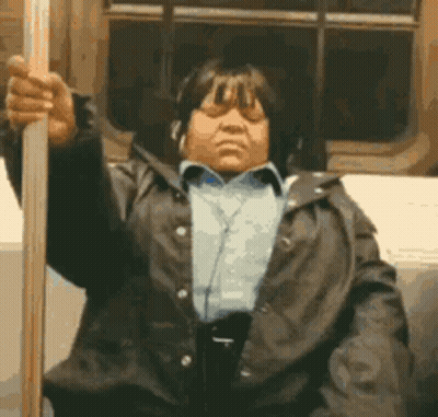 Woman With Headphones Holding Pole GIF