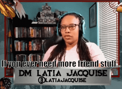 Woman With Headphones In Front Of Sign Saying If You Ever Need More Friend Stuff DM Latia Jacquise GIF