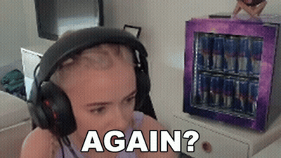 Woman With Headphones Near Red Bull Fridge GIF