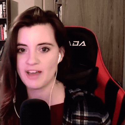 Woman With Headphones On Red And Black Chair Letter A GIF