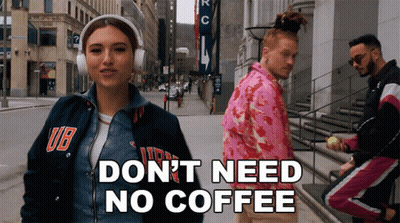 Woman With Headphones Saying Don't Need No Coffee GIF
